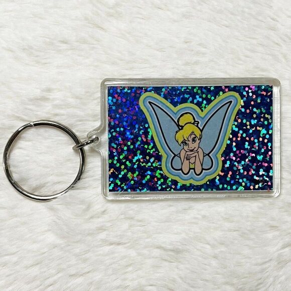 🔮 5/$25 Disney Peter Pan‎ Tinker Bell Holographic It's All About Me! Keychain - Picture 1 of 3